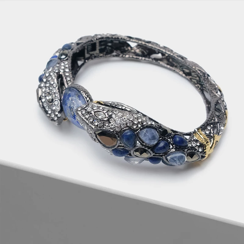 

Double headed snake hollowed out design exquisite retro bangles