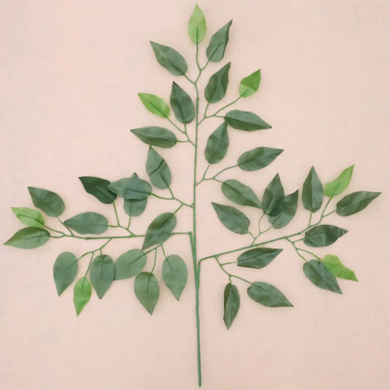 

simulation banyan leaves wedding decoration to the hotel shop background leaves