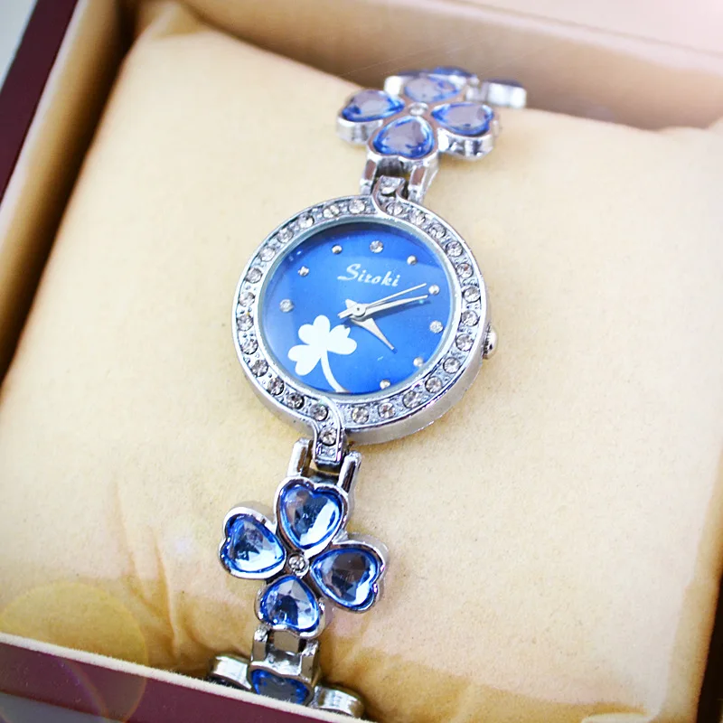 

New Fashion luxury Brand Women's Fashion quartz watch bracelet watch Four-leaf clover bracelet Flower Ladies wristwatches HR120