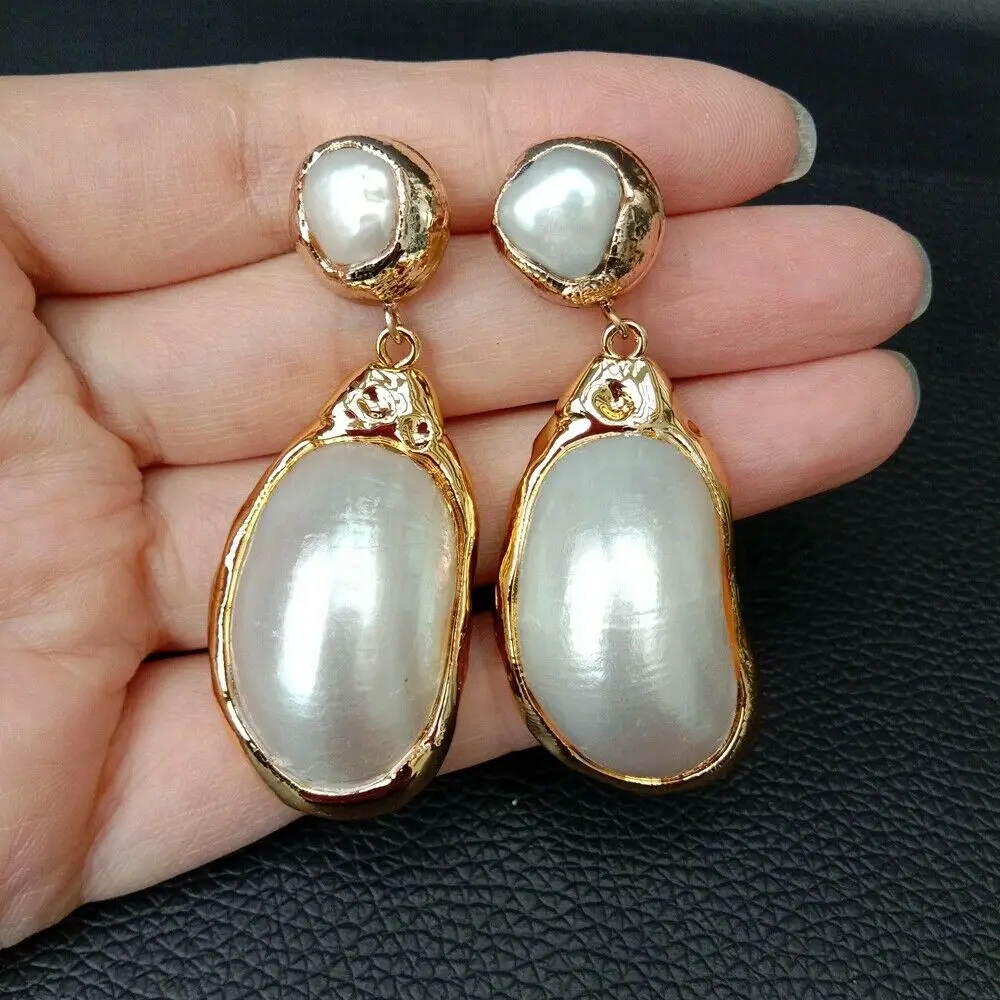 

Cultured Pearl White Sea Shell Golden Plated Earrings