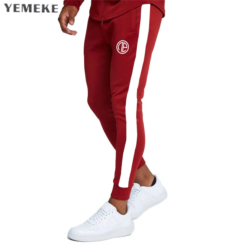 

YEMEKE Gyms Men Joggers Casual Men stitching Sweatpants Joggers Pantalon Homme Trousers Sporting Clothing Bodybuilding Pants