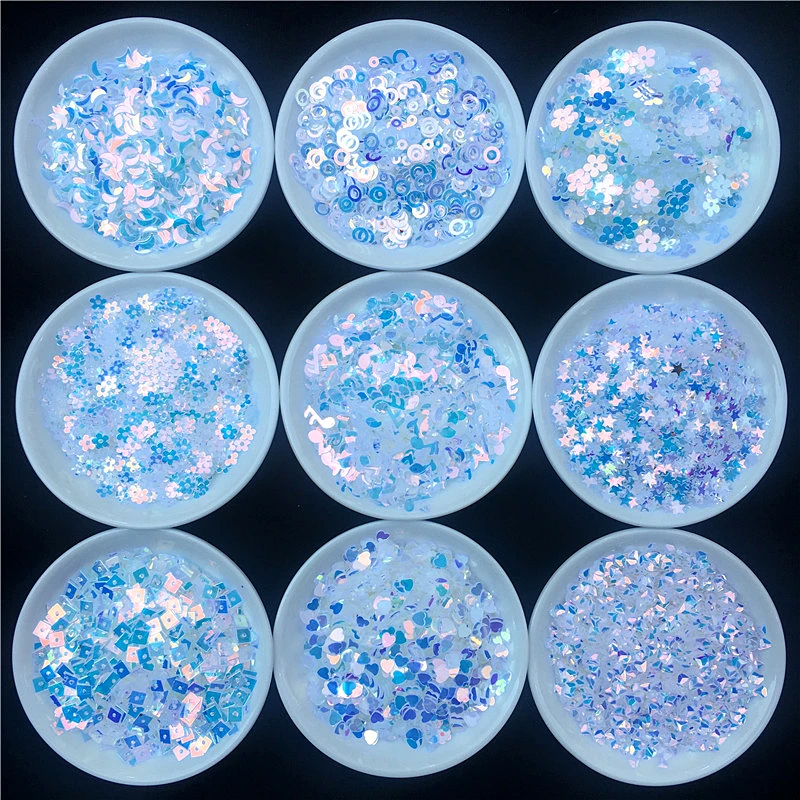 

10g/Pack Blue Crystal Nail Sequins PET Star Heart Moon Sakura Sequin Paillettes for manicure,wedding confetti,Nail Accessories