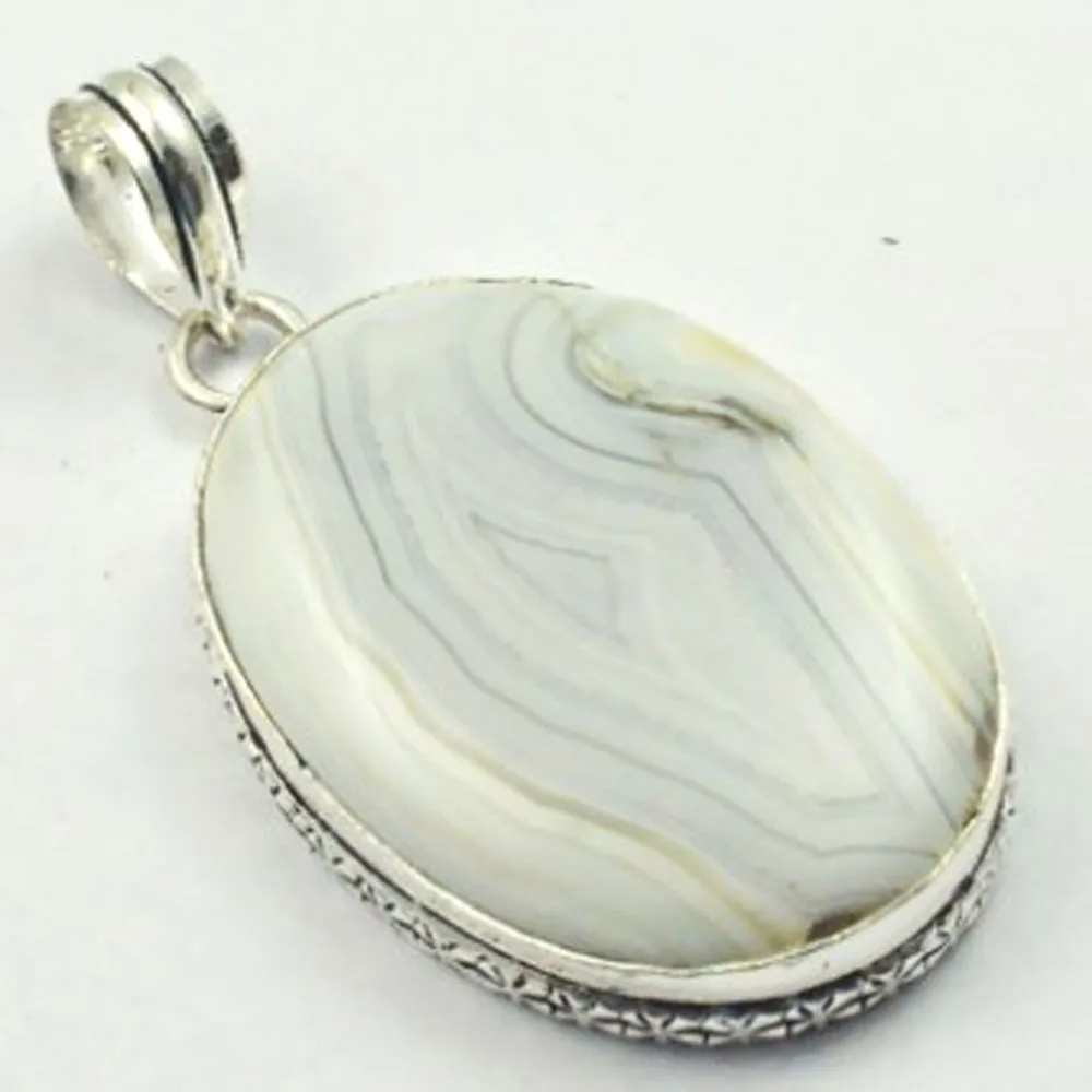 

Crazy Lace Agates Pendant Silver Overlay over Copper , 63 mm, P4406