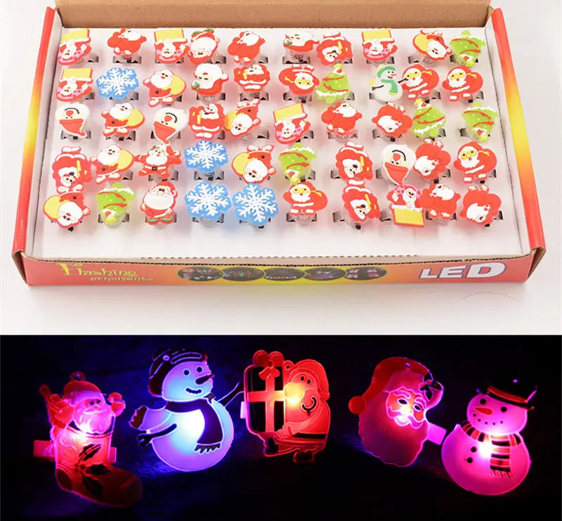 

[TOP] 50pcs/lot Flashing LED Light Up Toys Christmas Santa Claus Christmas tree Snowflakes Snowmen Ring toy kids girl gift