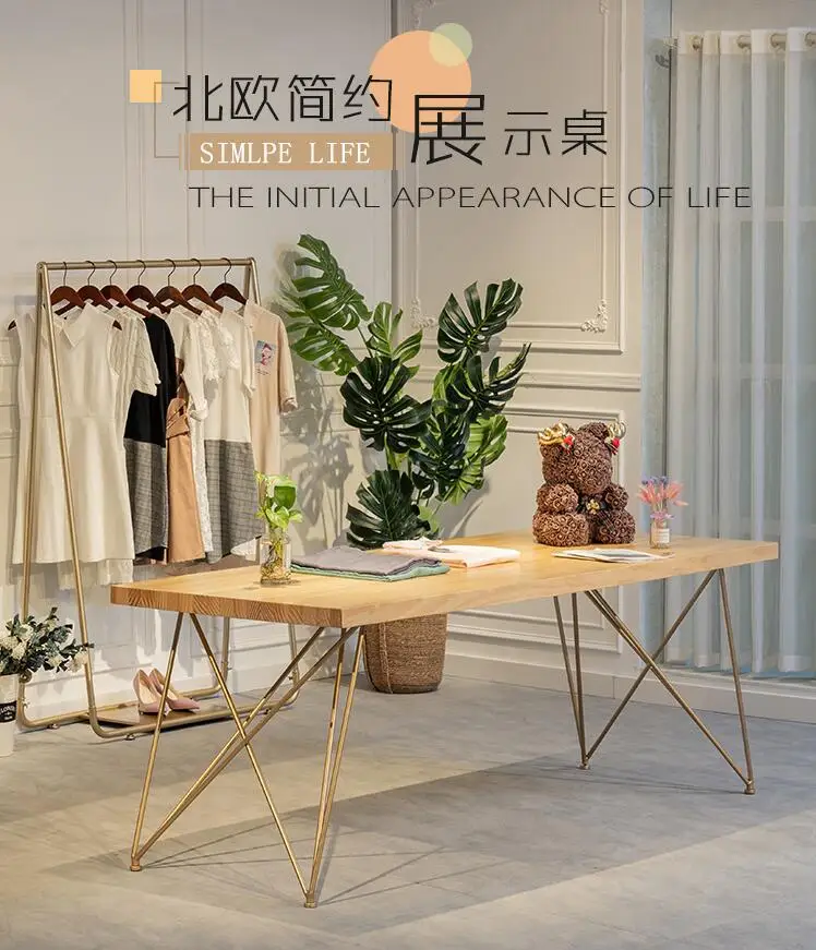 

Nordic clothing store white display rack, wrapped rack, retro solid wood display table, flowers in Zhongdao water table