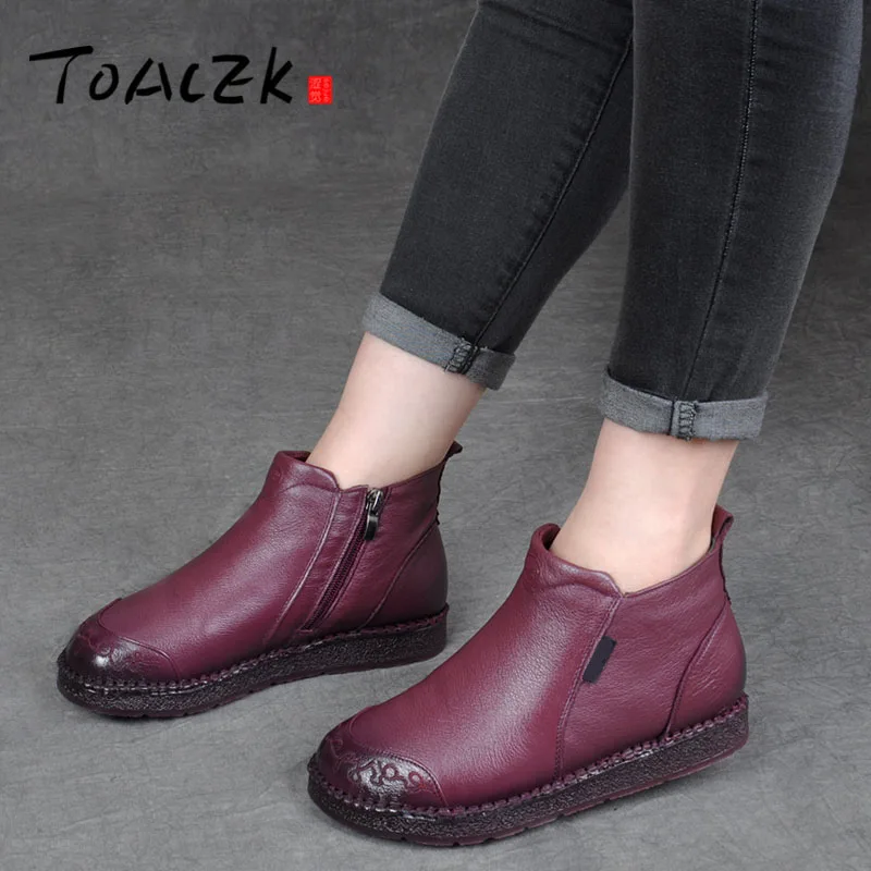 

The new cotton shoes women's leather and down short boots high help mother shoe thicken big size soft sole shoes