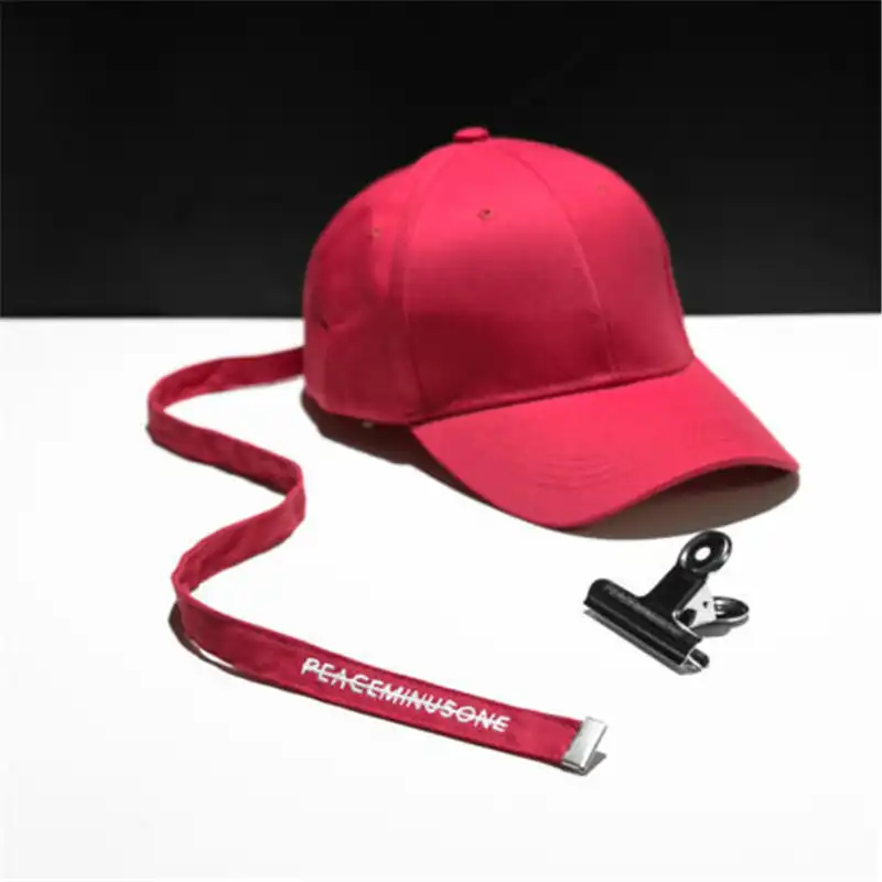 red and white ball cap