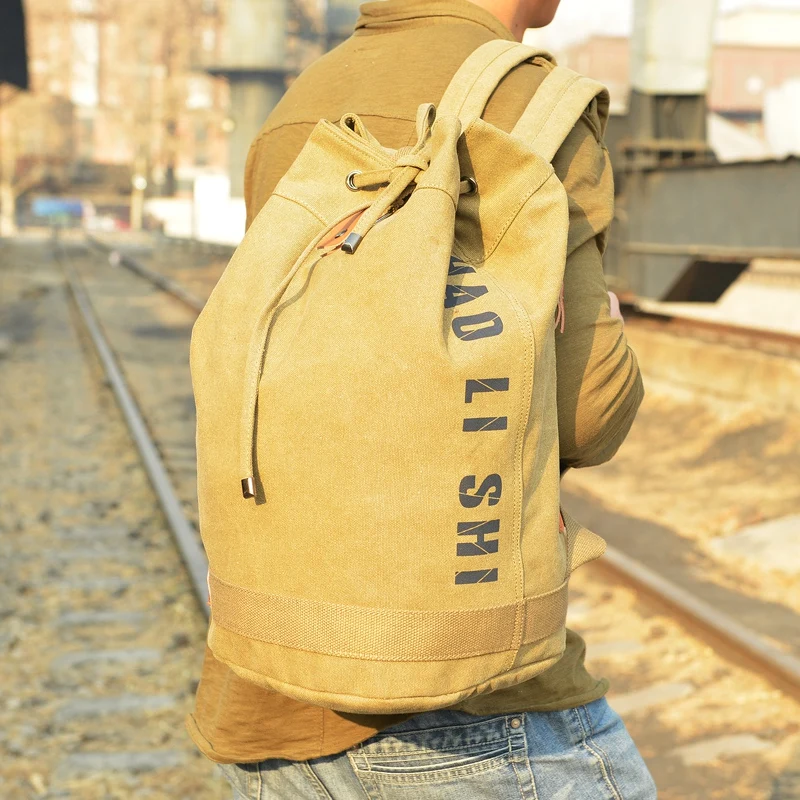

Men's Backpack New Large Capacity Men Drawstring Backpack Canvas Bucket Bag Fashionable fabric School Bag Male Schoolbag