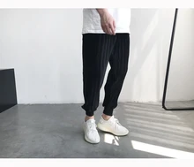 Spring and summer Korean version of the three-dimensional pleated velvet casual pants beam pants black boys Harlan nine points Spring and summer Korean version of the three-dimensional pleated velvet casual pants beam pants black boys Harlan nine points