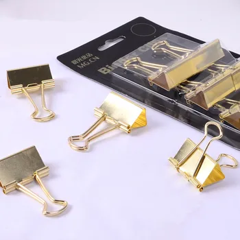 

golden clip gold binder clips