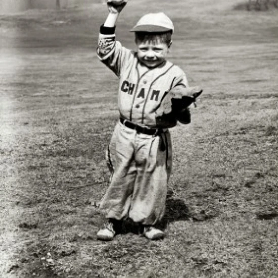 Portrait of a boy holding a baseball and a baseball glove Poster Print (18 x 24)