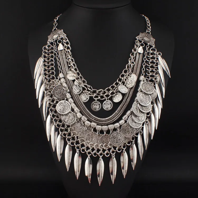 https://ae01.alicdn.com/kf/HTB1.YaFNVXXXXasapXXq6xXFXXXz/Danfosi-Boho-Vintage-Silver-Color-Leaf-Tassles-Graven-Coin-Pendant-Statement-Necklace-For-Women-Party-Dress.jpg