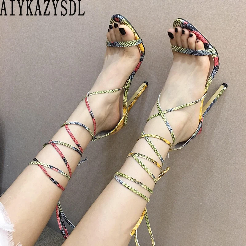 

AIYKAZYSDL Women Faux Snake Leather Sandals Cross Strap Mixed Color Summer Bootie Gladiator Rome Sandals High Heel Stilettos