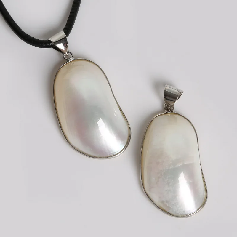 

Hot Selling High Quality 26x55mm Natural Mother of Pearl Shell Pendants Beads For Jewelry Making Finding DIY Necklace