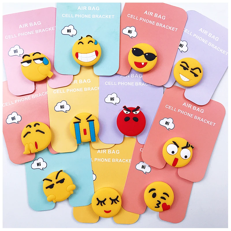 

New Universal mobile phone bracket Expanding Stand and phone grip cartoon Emoticon package phone holder desktop bracket