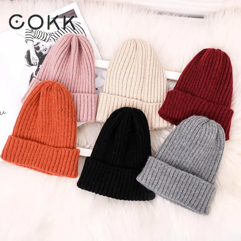 

COKK Stripe Knitted Hat Winter Cap Bonnet Women's Hat Female Casual Beanies Stretch Hats For Women Girls Ladies Thick Warm 2019