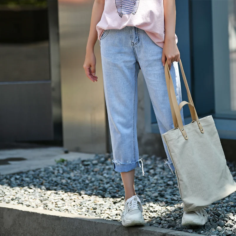 

N2892 South Korean version of the joker slim straight tube gas blue show nine minutes of hair edge jeans women summer