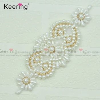 

Pretty pearl applique for wedding dress and headband. WRA-981