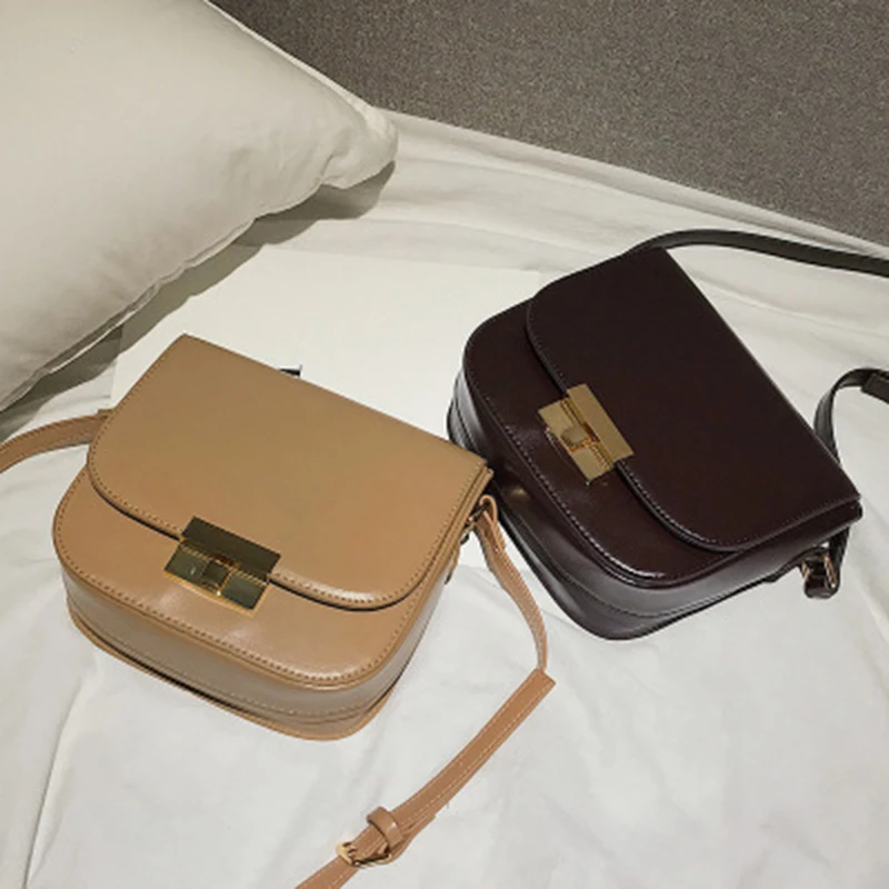 

2019 explosion models crossbody retro saddle bag Hong Kong style single shoulder simple fashion multi-function wild female bag