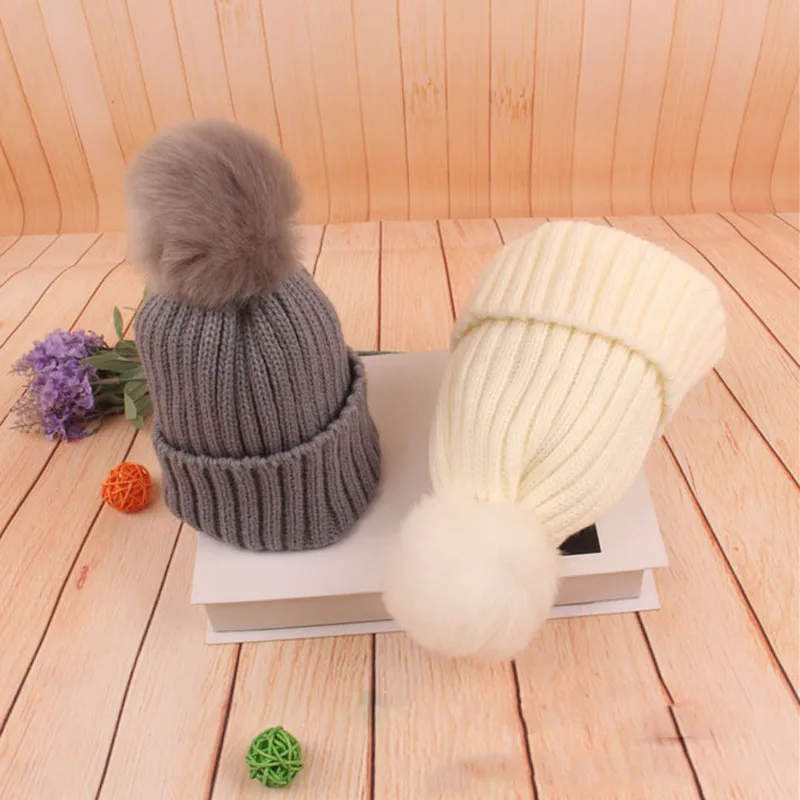 

2019 Kids Girl Boy Winter Hats Knitted Warm Hats With Bow Children Caps Pompoms Ball Solid Color Ear Warmer Soft Beanies Cap