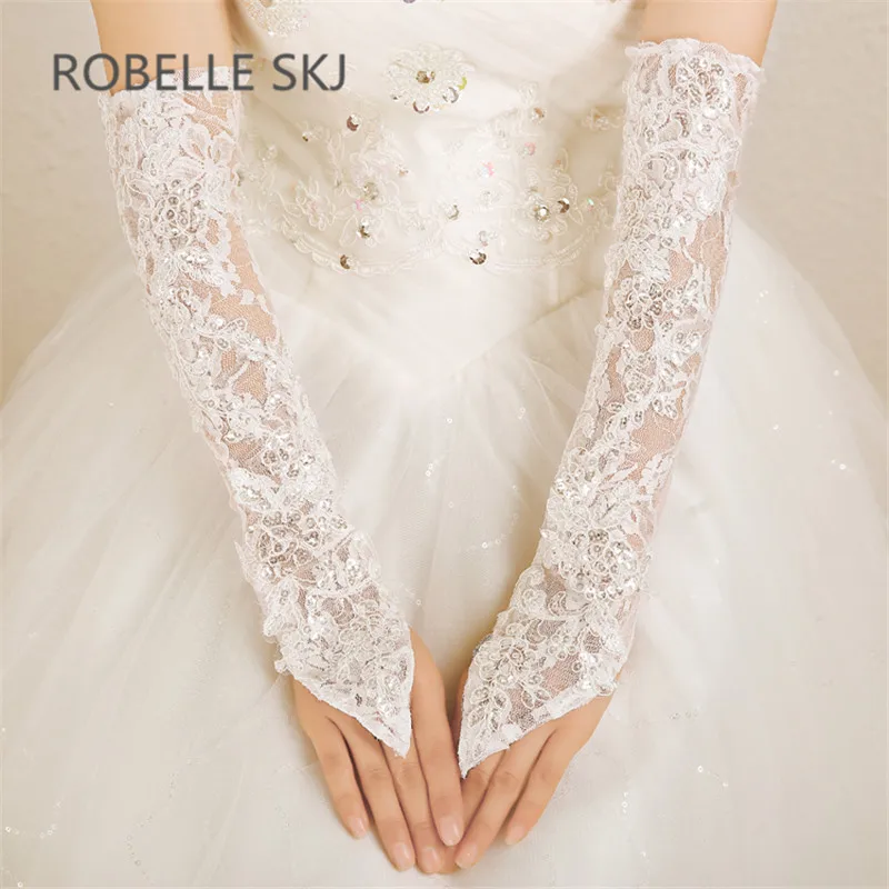 

Elbow Length Sheer Lace Bridal Gloves Wedding Gloves for Bride Ivory with Lace and Sequins Liga Nupcial