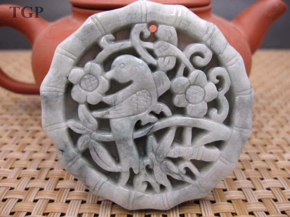 

Natural grade A jadeite carved round magpies and wintersweet Sweater pendants jade with certificate together