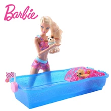 Barbie bañando a sus perritos
