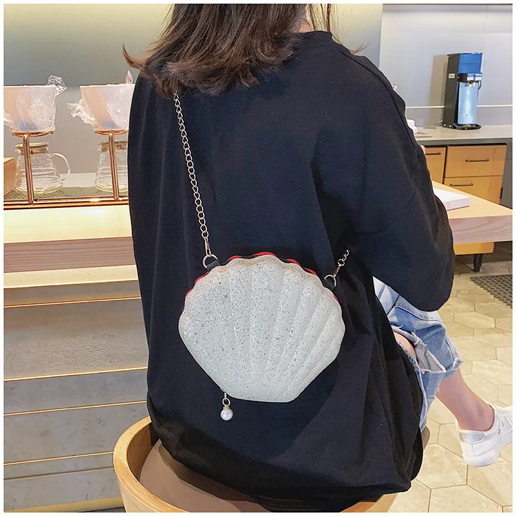 

Korean version of the summer new cute bright star pearl shell bag shoulder diagonal package