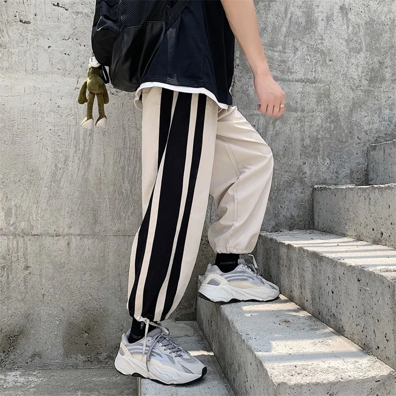 

2019 Summer men's casual Korean version of the wild elastic waist loose nine points beam foot sports pants hip hop Black