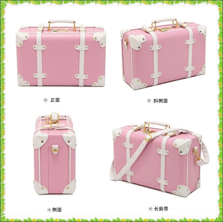 small pink luggage