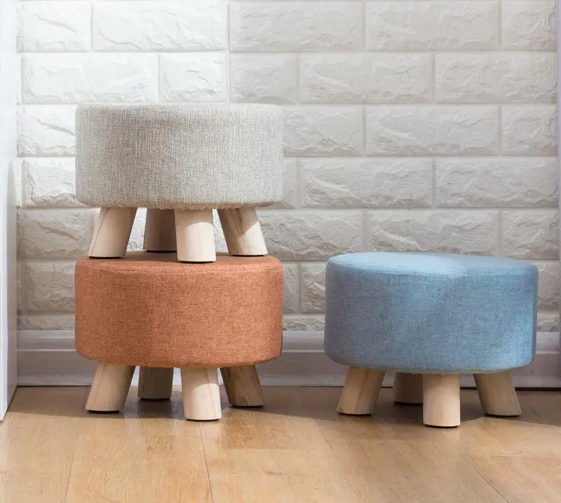 

Modern Luxury Upholstered Footstool Nordic Round Pouffe Stool Wooden Leg Pattern Round Fabric 4 Legs