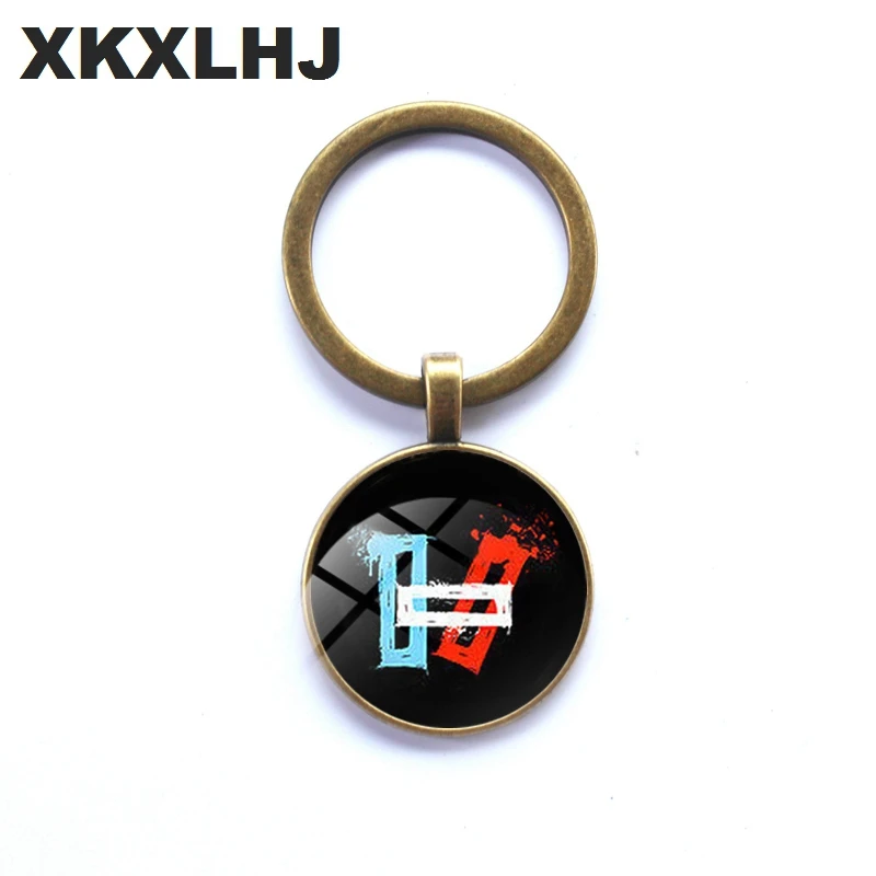 

XKXLHJ Twenty One Pilot Cute Keychain American Rock Band POM POM Key Chain Steampunk Jewelry Ladies Men's Gift