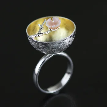 

Creative Design of Chinese Classical Elements Stereoscopic shell plum blossom ring S925 Silver Ring Open Adjustable Ring