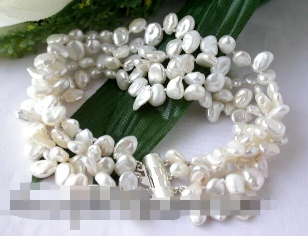 

free shipping 09708 4strands baroque white keshi pearl bracelet