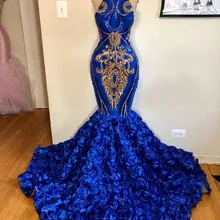 royal blue and gold prom couple