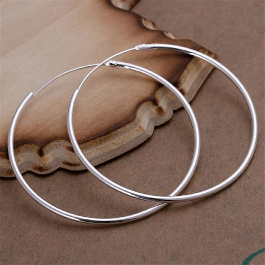 

factory price E042 wholesale round circle Smooth girl silver color earrings high quality fashion classic jewelry antiallergic