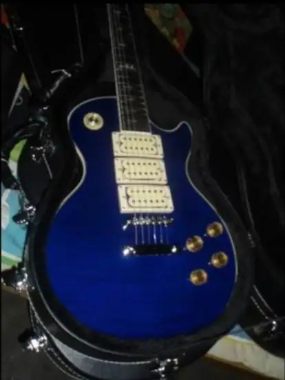 

Wholesale New G Cnbald Ace Frehley Electric Guitar Mahogany Body In Blue Burst 2009 price not include the case