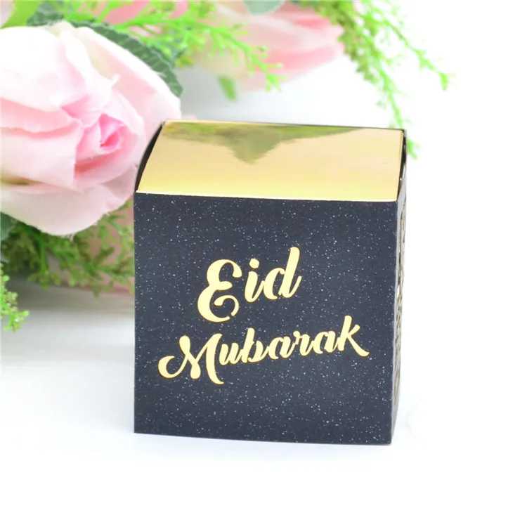 

Eid Mubarak laser cut gold gift box with black pearl sleeve