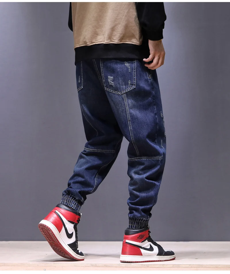 В стиле панк высокие мужские джинсы стрит-стайл Мода Jogger Брюки Винтаж ботильоны объединились Рваные джинсы для Для мужчин хип-хоп сращены