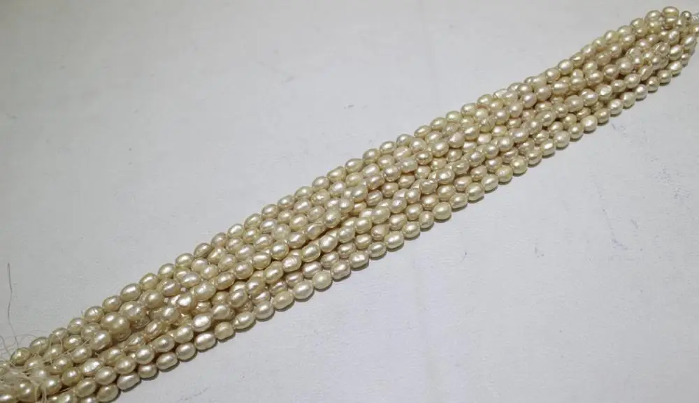 

Champagne Rice Fresh water pearl necklace 8x10mm 15 No Metal "Handmade