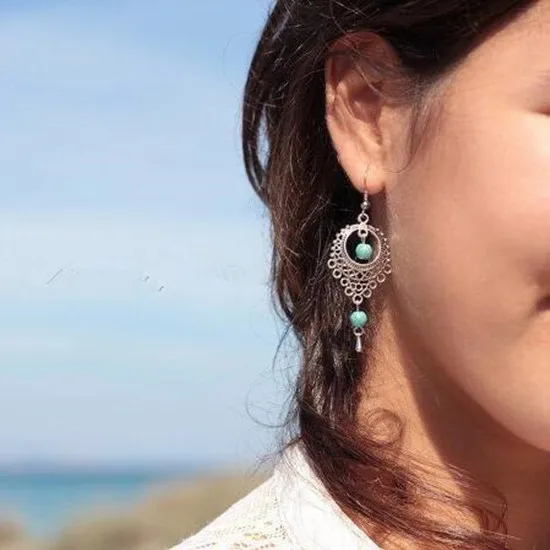 

ea823 Fashion vintage ethnic style openwork blue round stone Water droplets shape tassel earrings Female jewelry accessories