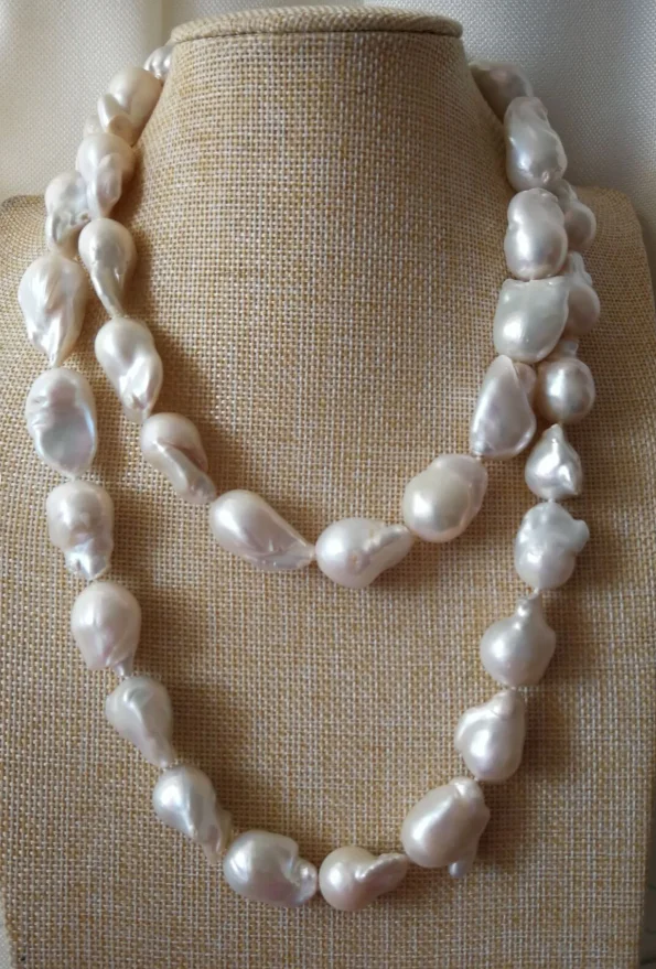 

22-30 mm natural South white pearl necklace 35"