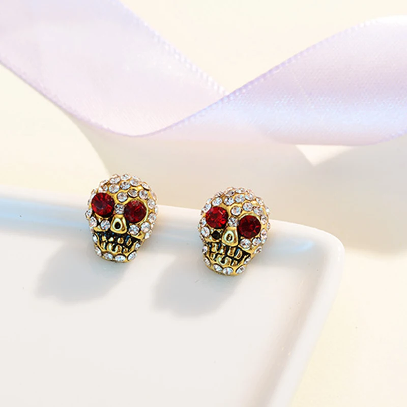 

CHITCHAT Red Eyes Skull Head Stud Earrings Shining CZ Crystal Skeleton Earrings Small Jewelry For Halloween Hip hop Gift