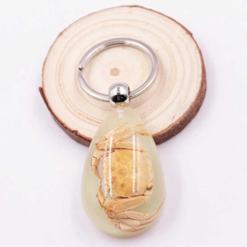 High quality Innovative design crab transparent tear drop resin luminous key ring chain