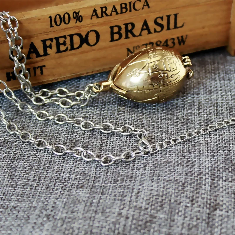 

The Lord of the Rings Harrys Potters Restoring Fire Dragon Egg Necklace Time Converter Gothic Long Sweater Chain Drop Ship