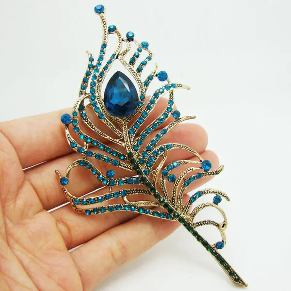 Yodio 1 Pc Cute New Blue Rhinestone Crystal Peacock Feather Brooch Pins for Women Girl Yodio 1 Pc Cute New Blue Rhinestone Crystal Peacock Feather Brooch Pins for Women Girl