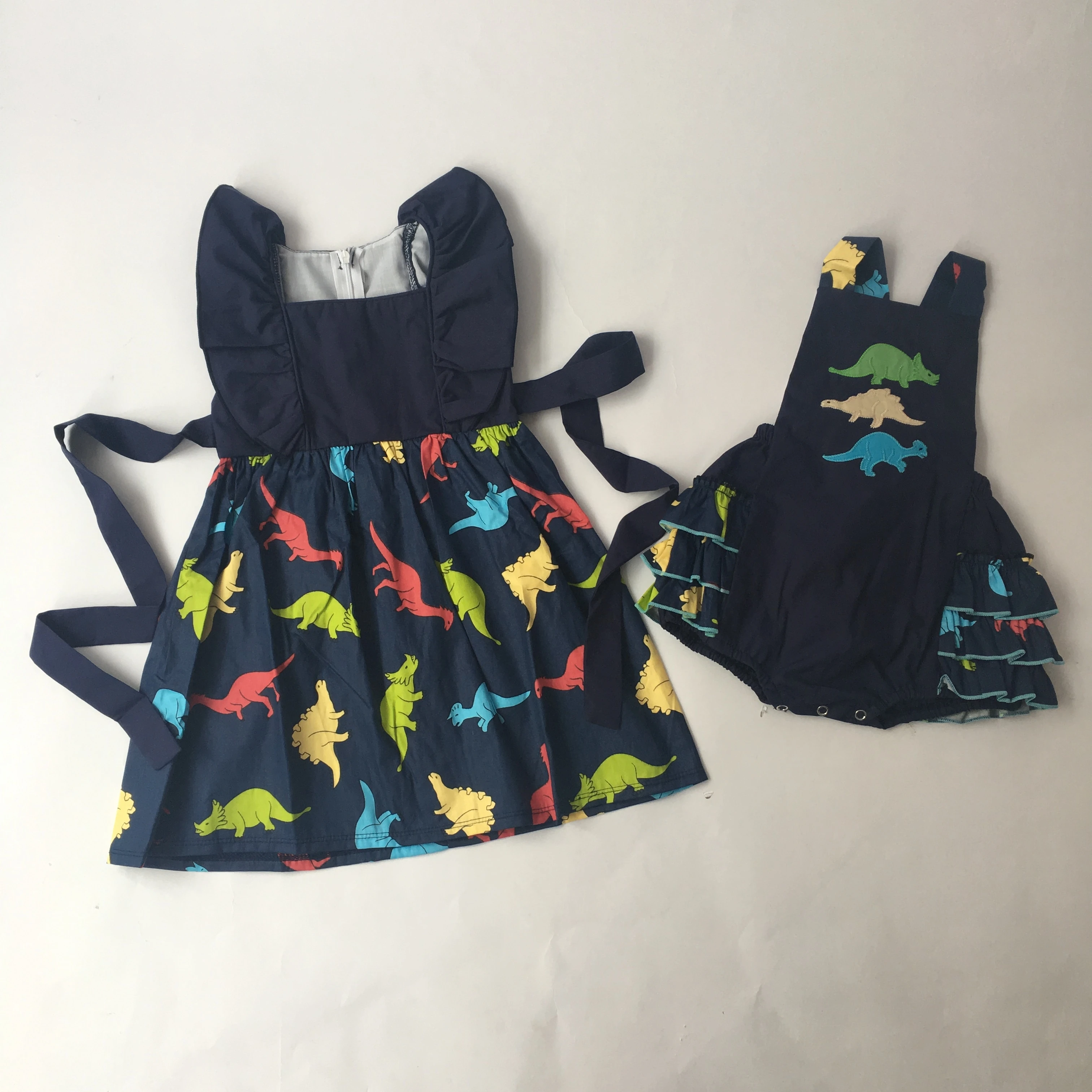 Puresun Fashion Sibling Dinosaur Design Girls Romper Cartoon Applique Bubble Girl Navy Blue Ruffle Boutique Baby Clothing