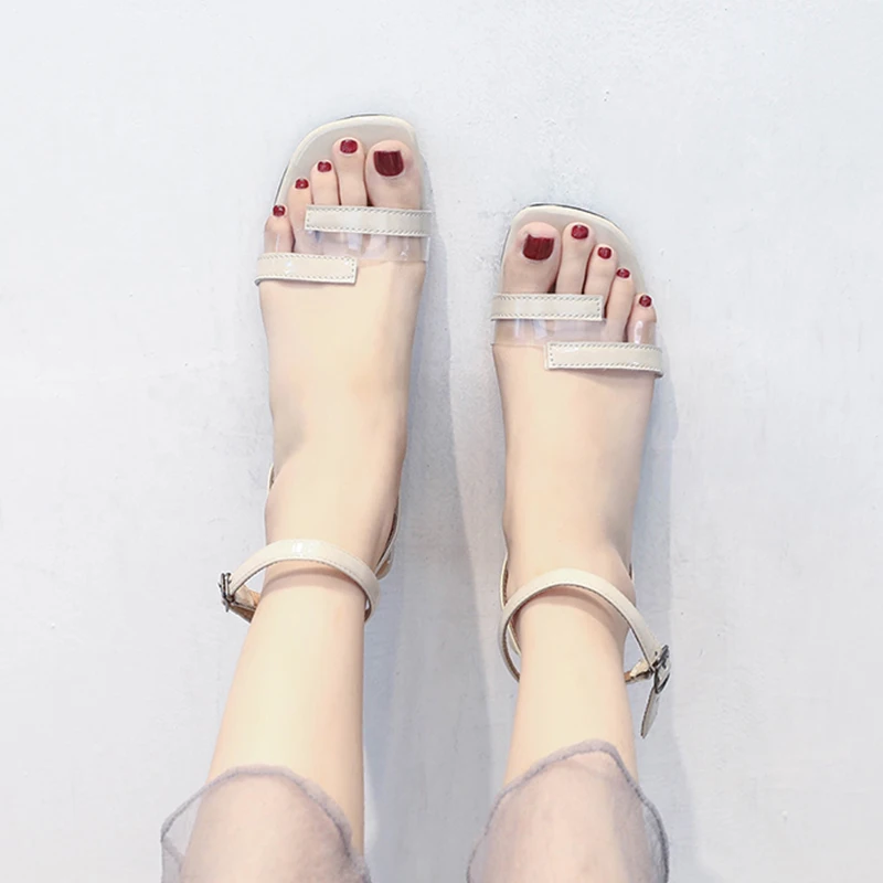 

Summer simple word with Roman shoes wearing a heel with a retro evening shoes Fairy sandals