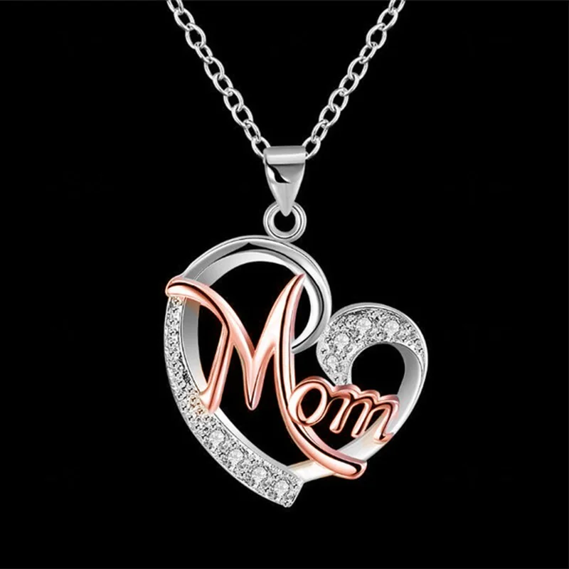 This exquisite Mom Heart Shape Inlaid Crystal Necklace adds an elegant touch of sophistication to any look. Crafted with exact precision and inlaid with shimmering crystals, this sophisticated necklace is a timeless piece of jewelry sure to be cherished for a lifetime.