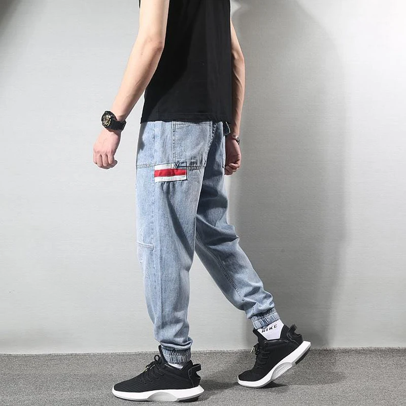 

Fashion Streetwear Men Jeans Loose Fit Ripped Jeans Men Big Pocket Denim Cargo Pants Harem Trouser Designer Hip Hop Jogger Jeans